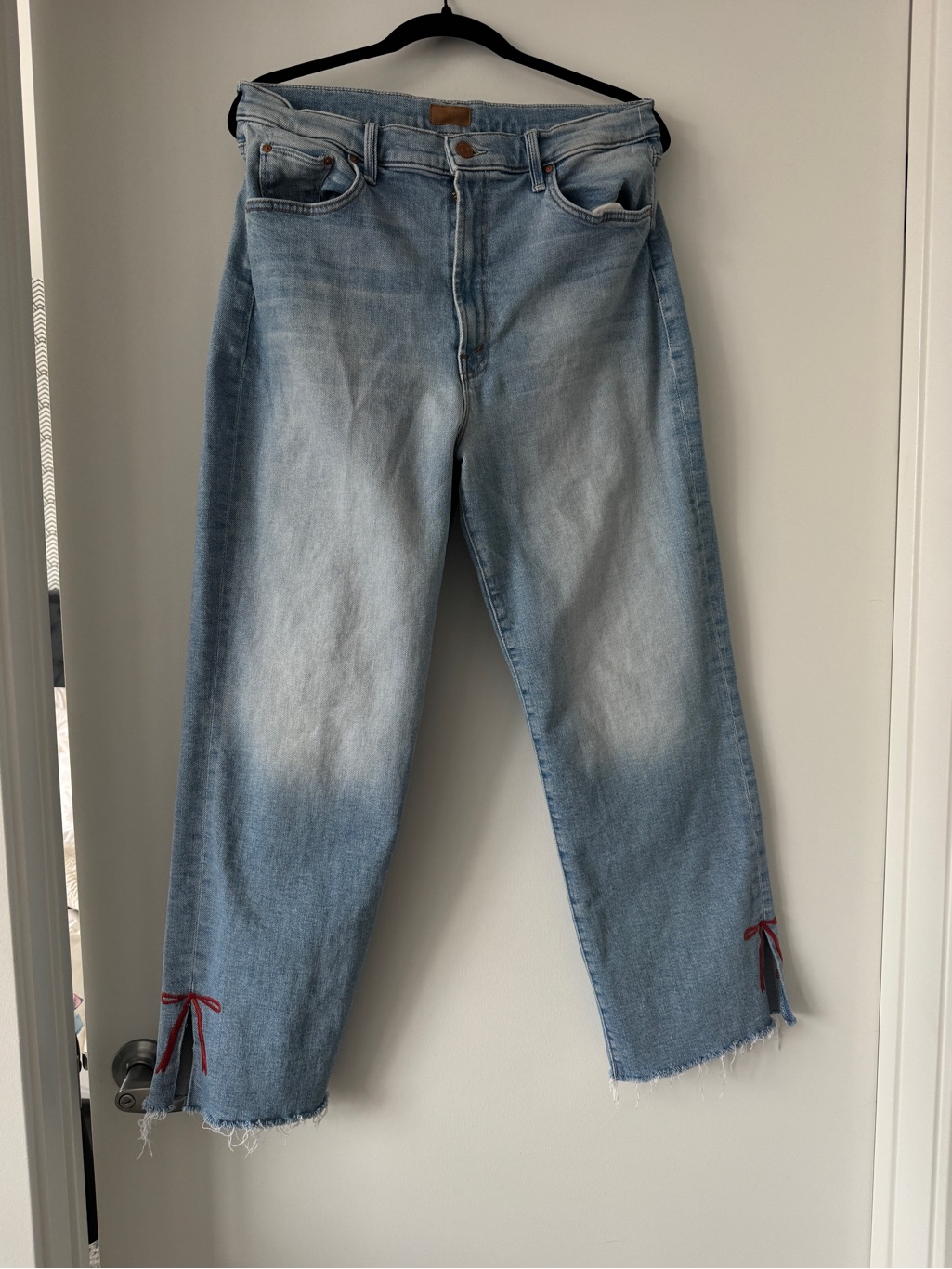 Mother Light Wash Blue Jeans With Red Bow Detail